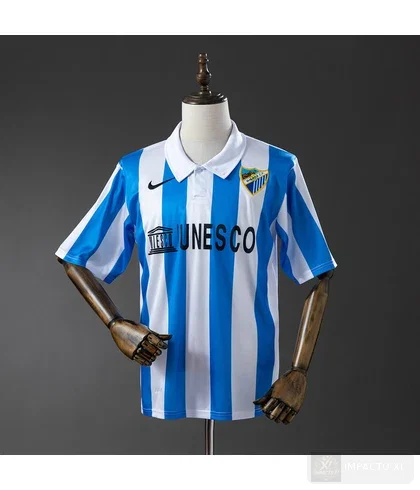Camiseta Málaga equipación local 2012/13 · Retro